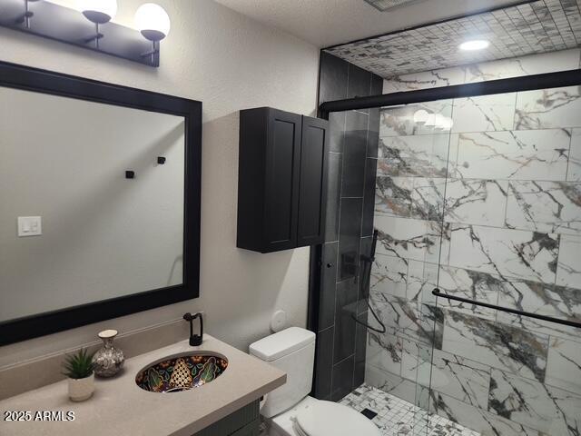 4419 North 27th Street, Unit 2 Phoenix, AZ 85016 - Photo 14 of 37 a bathroom with a sink toilet and shower