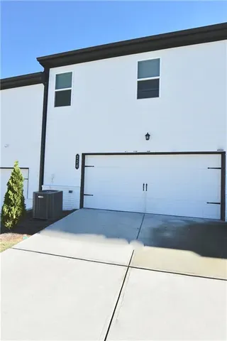 a kitchen with a refrigerator and a stove