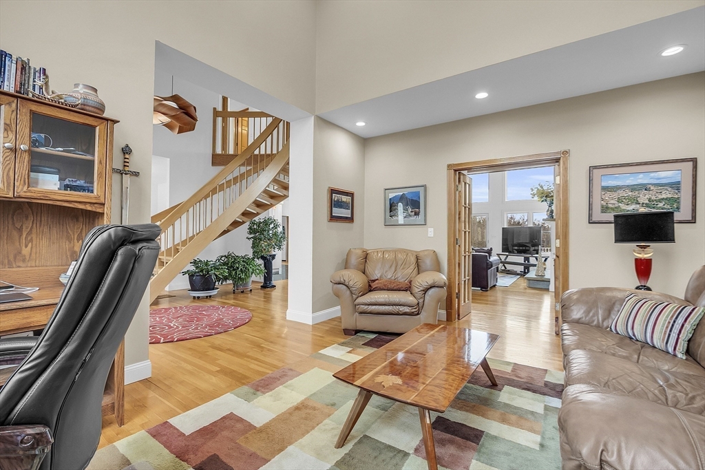 148 Houghton Road Princeton, MA 01541 - Photo 20 of 42 a living room with furniture and a flat screen tv