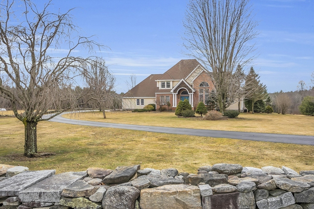 148 Houghton Road Princeton, MA 01541 - Photo 2 of 42 a view of an ocean with trees