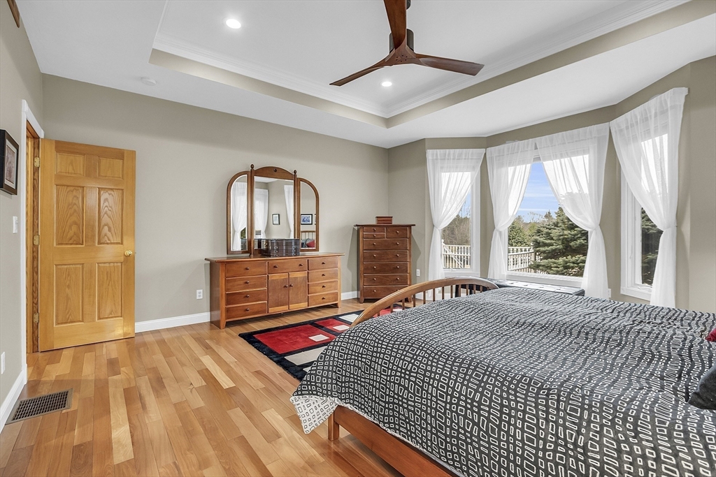 148 Houghton Road Princeton, MA 01541 - Photo 24 of 42 a bedroom with a bed dresser and a window
