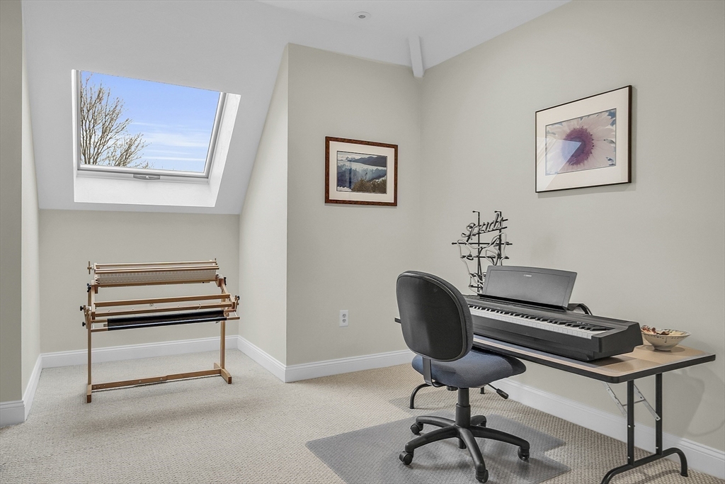 148 Houghton Road Princeton, MA 01541 - Photo 32 of 42 a view of a workspace with furniture