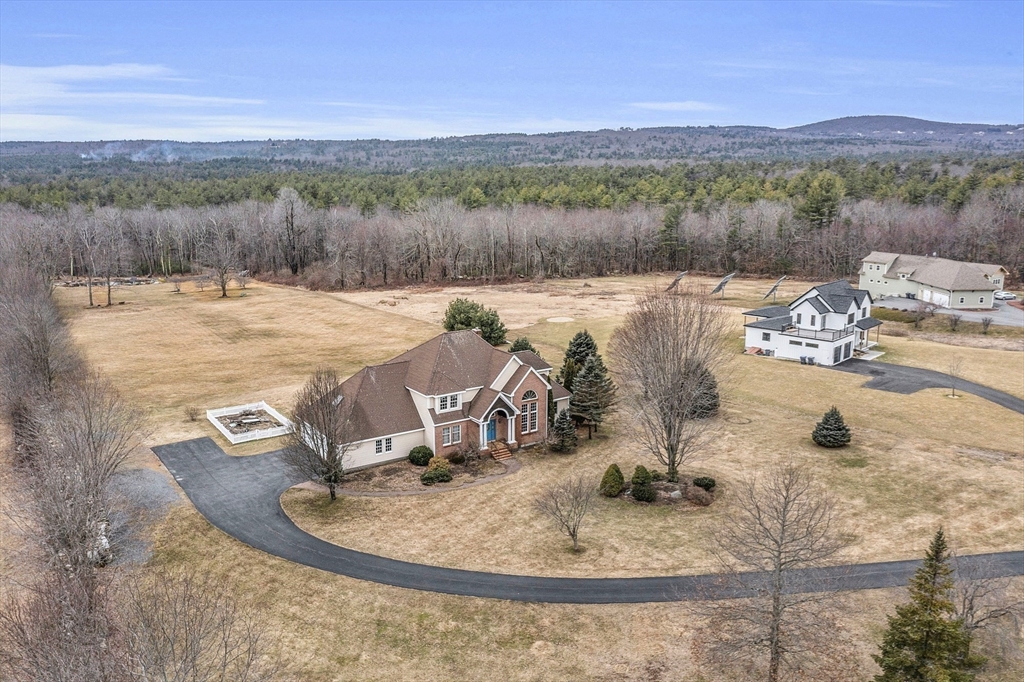 148 Houghton Road Princeton, MA 01541 - Photo 38 of 42 a view of a swimming pool with a yard and mountain view