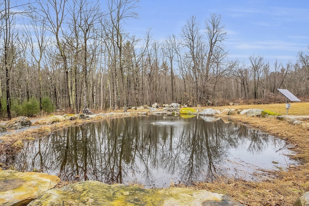 148 Houghton Road Princeton, MA 01541 - Photo 42 of 42 a view of swimming pool with a yard