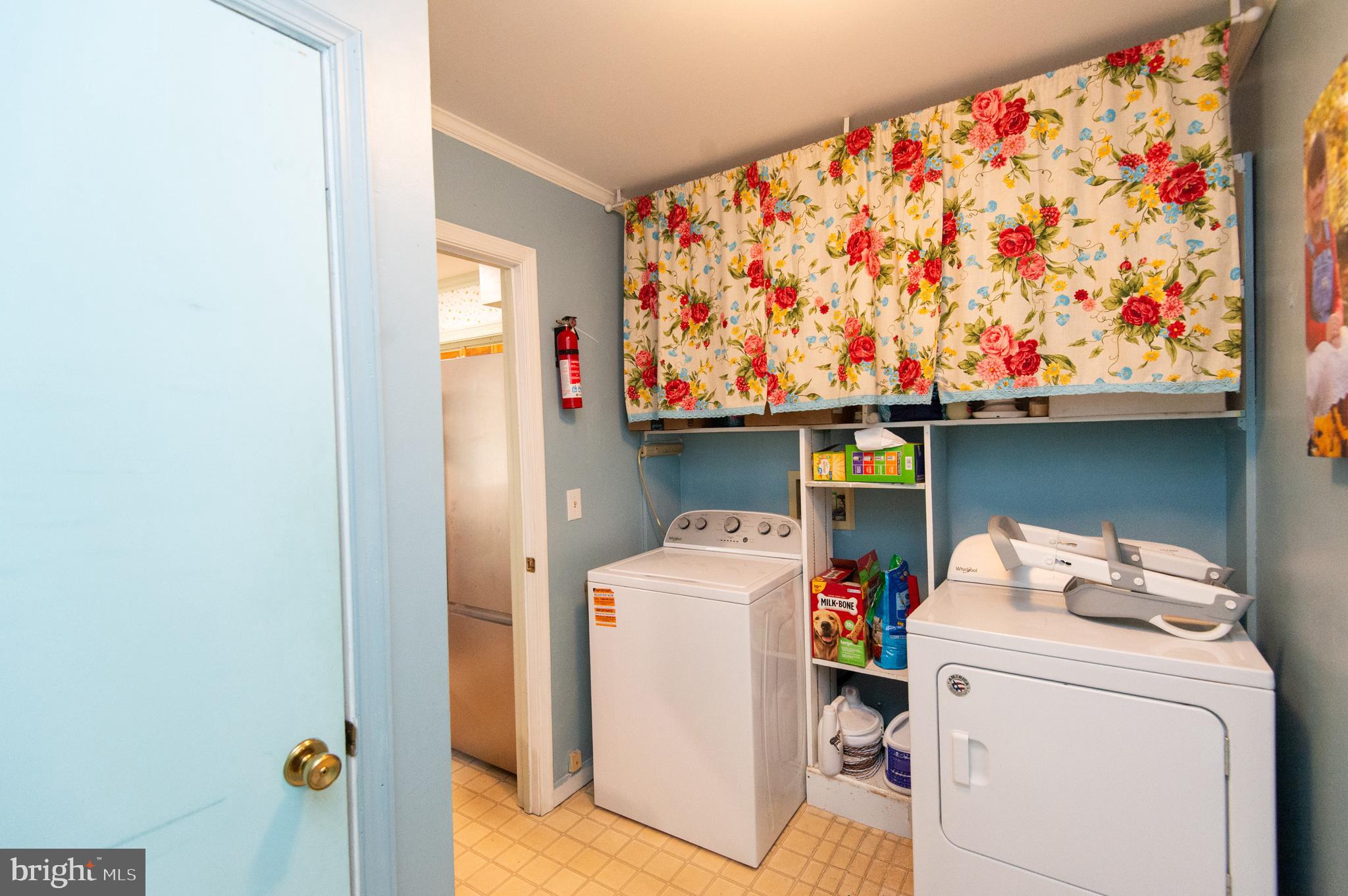 9472 Quail Run Road Denton, MD 21629 - Photo 14 of 50 a utility room with dryer and washer