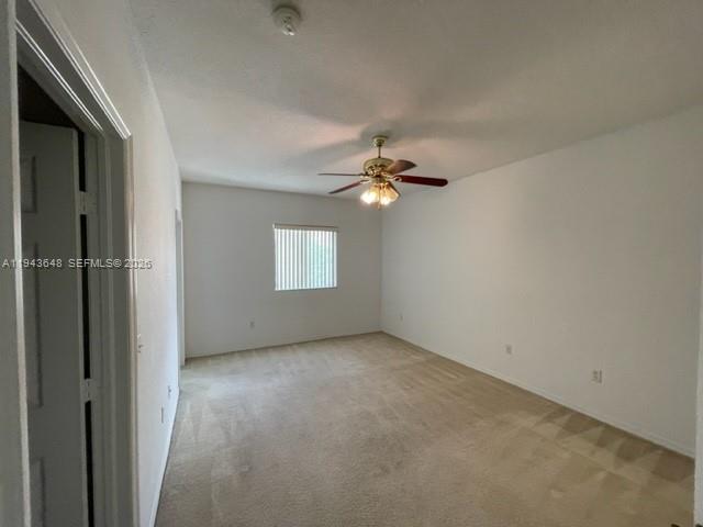 1941 Southeast 23rd Terrace, Unit 1941 Homestead, FL 33035 - Photo 4 of 7 a view of a livingroom with a window