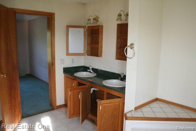 4784 Hogback Road Fowlerville, MI 48836 - Photo 15 of 18 Master Bathroom