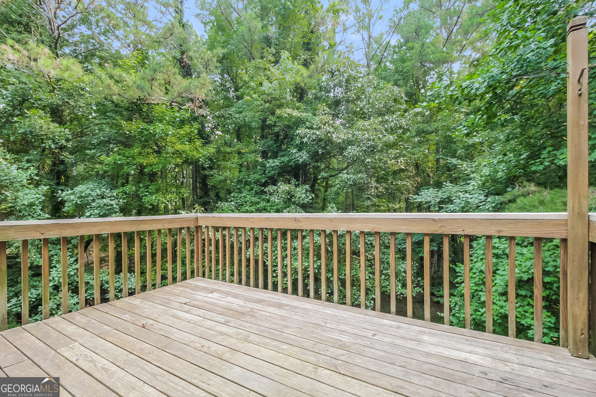 124 Emerald Pines Drive Dallas, GA 30157 - Photo 14 of 17 a balcony with wooden floor and fence