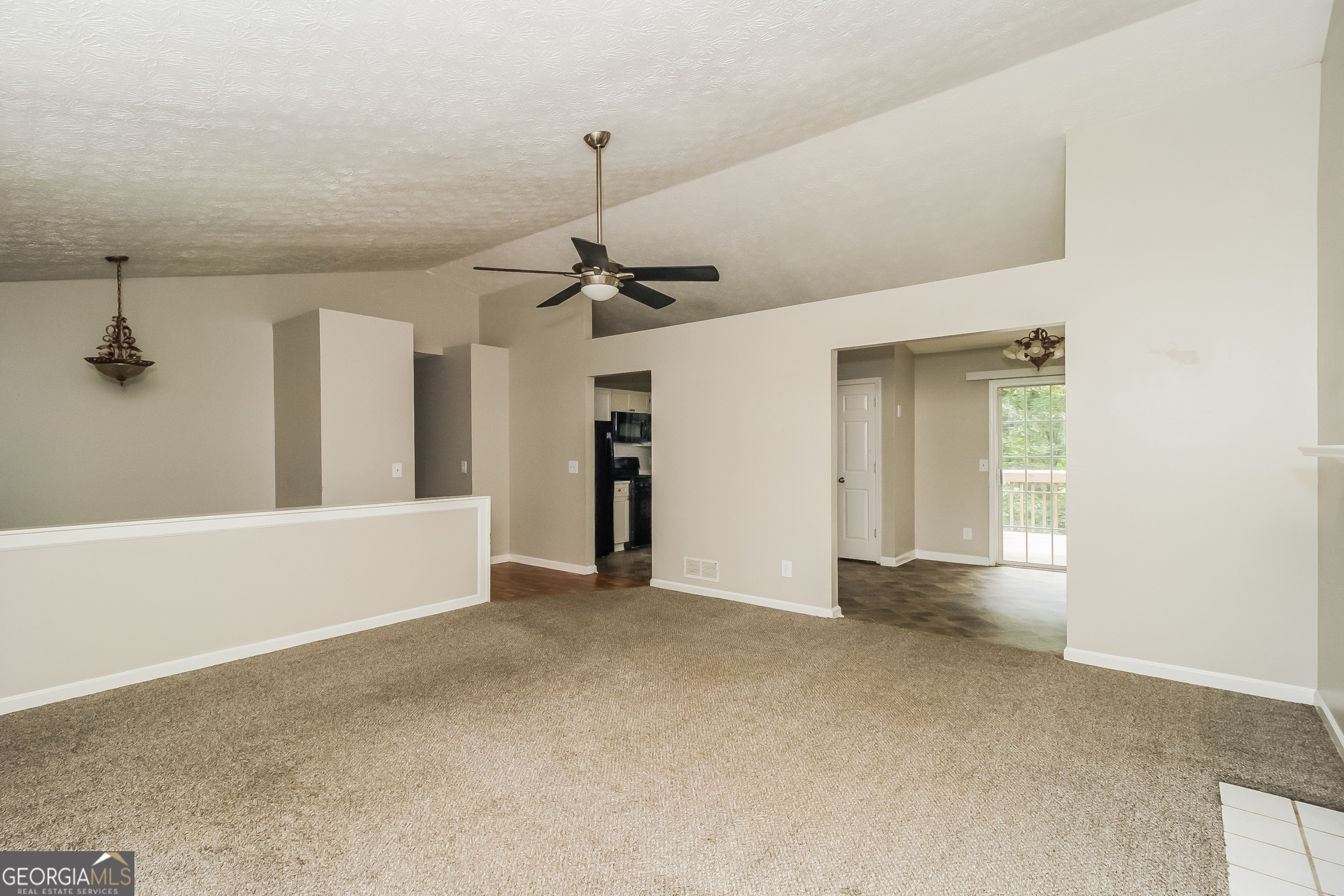 124 Emerald Pines Drive Dallas, GA 30157 - Photo 4 of 17 a view of an empty room with a window