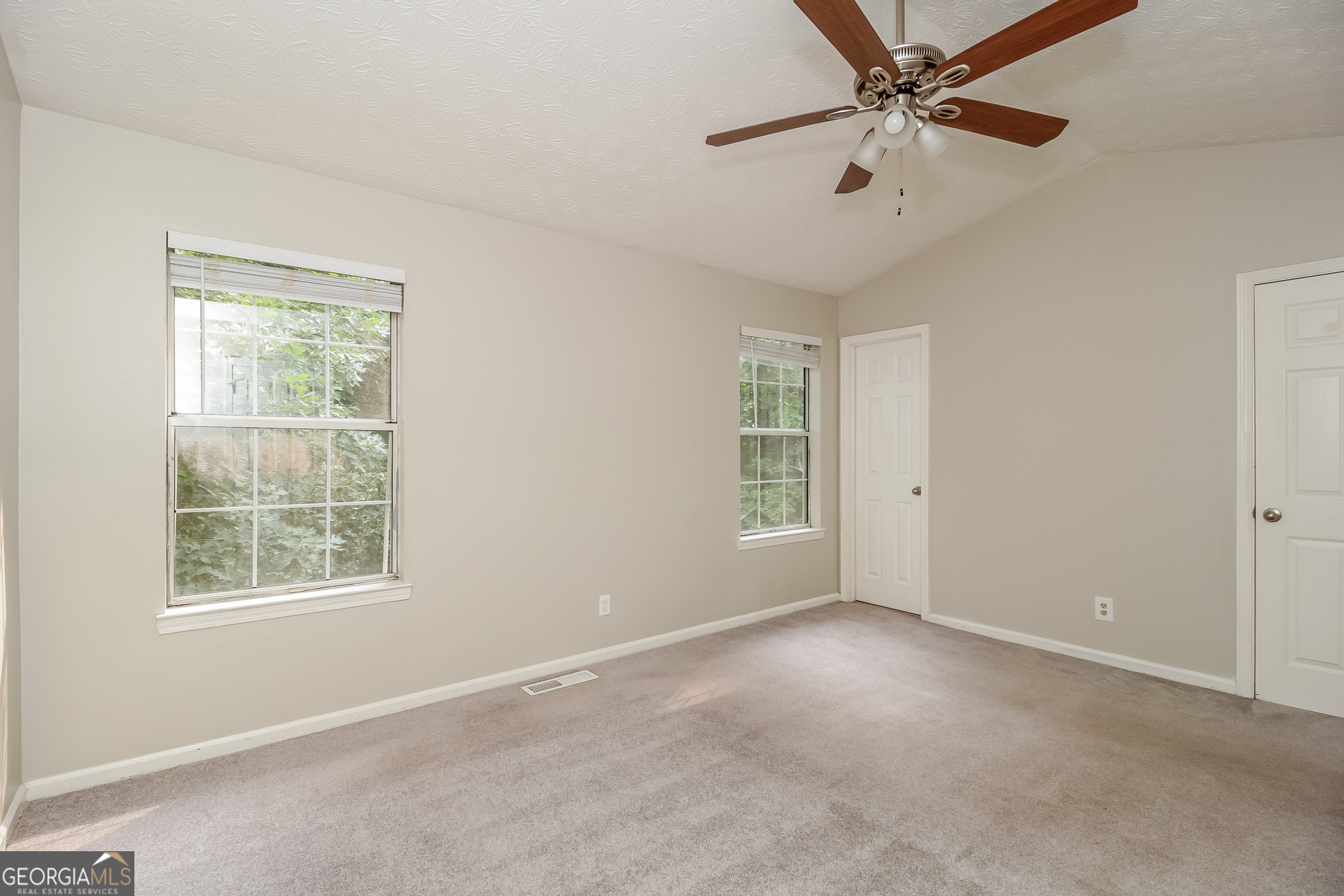124 Emerald Pines Drive Dallas, GA 30157 - Photo 8 of 17 a view of an empty room with a window