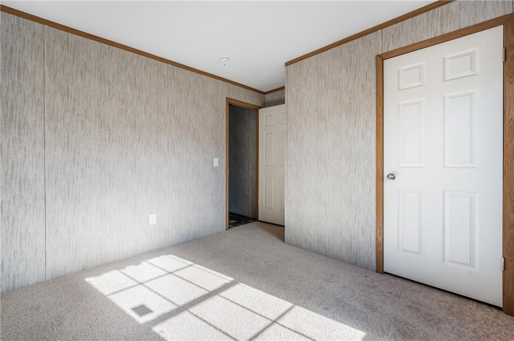 69 South Summit Road, Unit 102 Greenville, PA 16125 - Photo 22 of 24 an empty room with windows