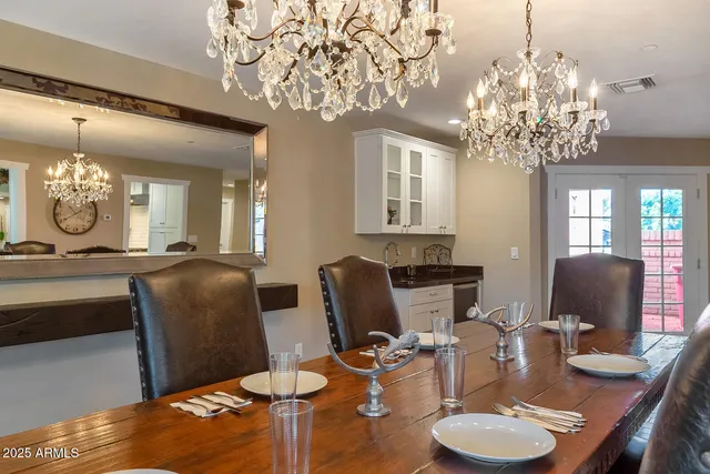 a spacious bathroom with a double vanity sink and a mirror