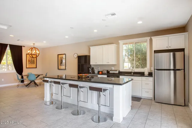 a view of a house with backyard