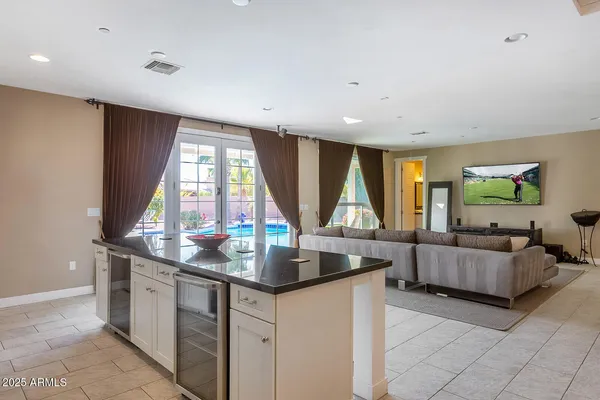 a view of a swimming pool with lounge chair