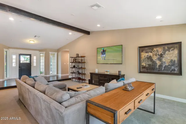 a kitchen with stainless steel appliances granite countertop a stove and a refrigerator