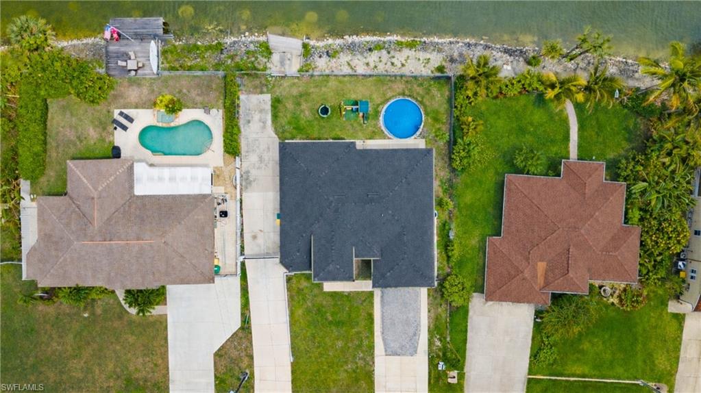 2998 52nd Street Southwest Naples, FL 34116 - Photo 41 of 44 Drone / aerial view of a pool