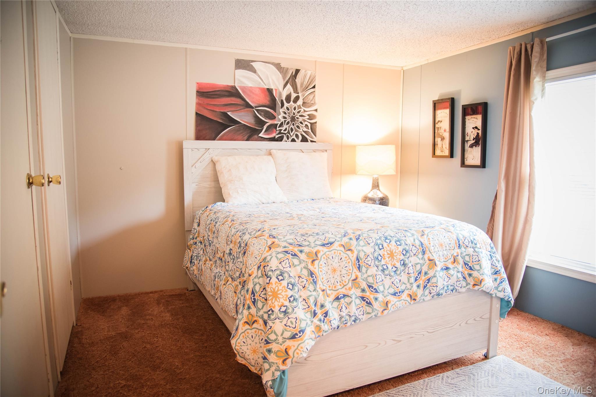 502 Myers Road Neversink, NY 12765 - Photo 32 of 38 a large bed sitting in a bedroom next to a window