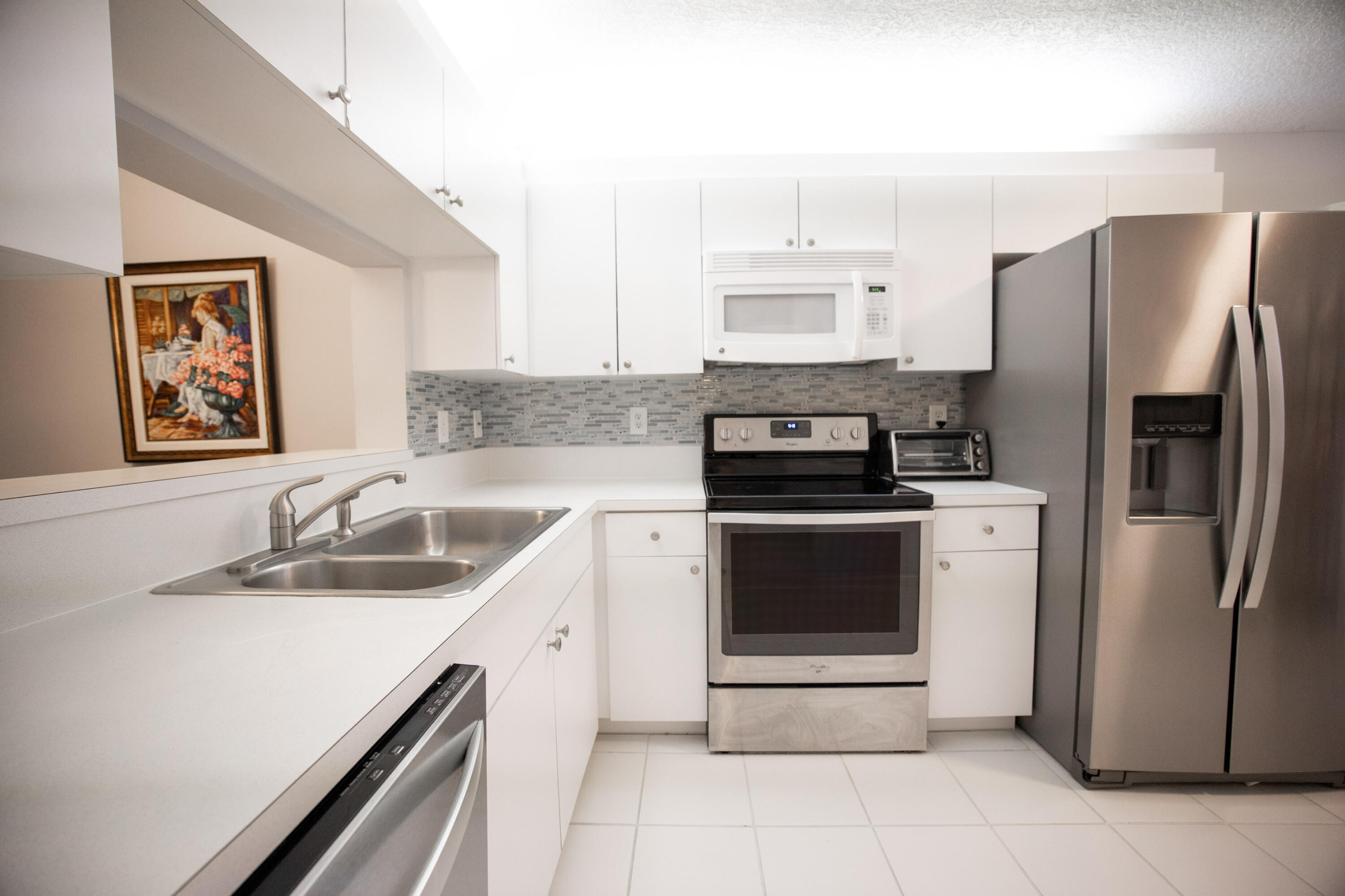 340 Northwest 67th Street, Unit 107F Boca Raton, FL 33487 - Photo 7 of 33 IF7A9959