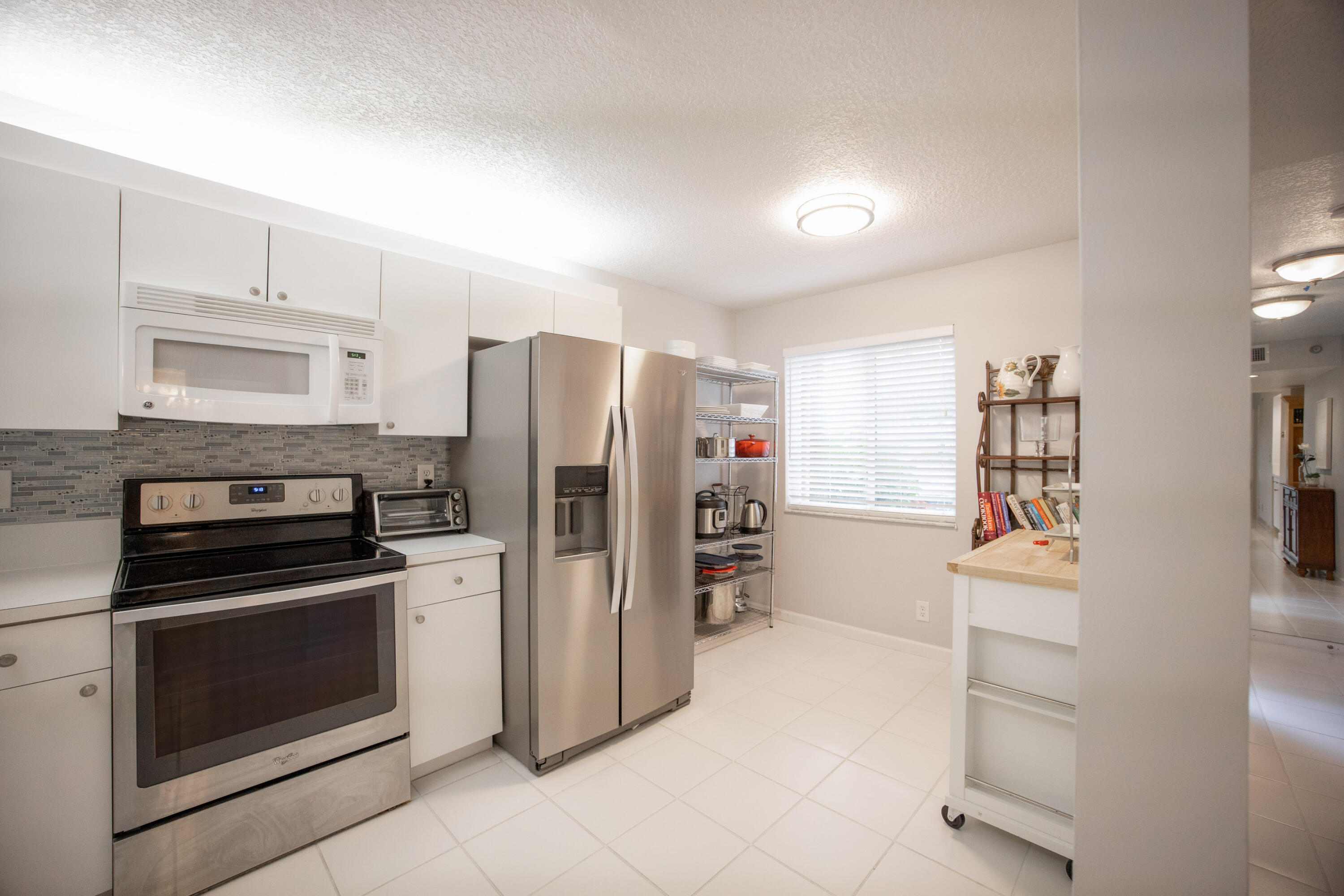 340 Northwest 67th Street, Unit 107F Boca Raton, FL 33487 - Photo 8 of 33 IF7A9960