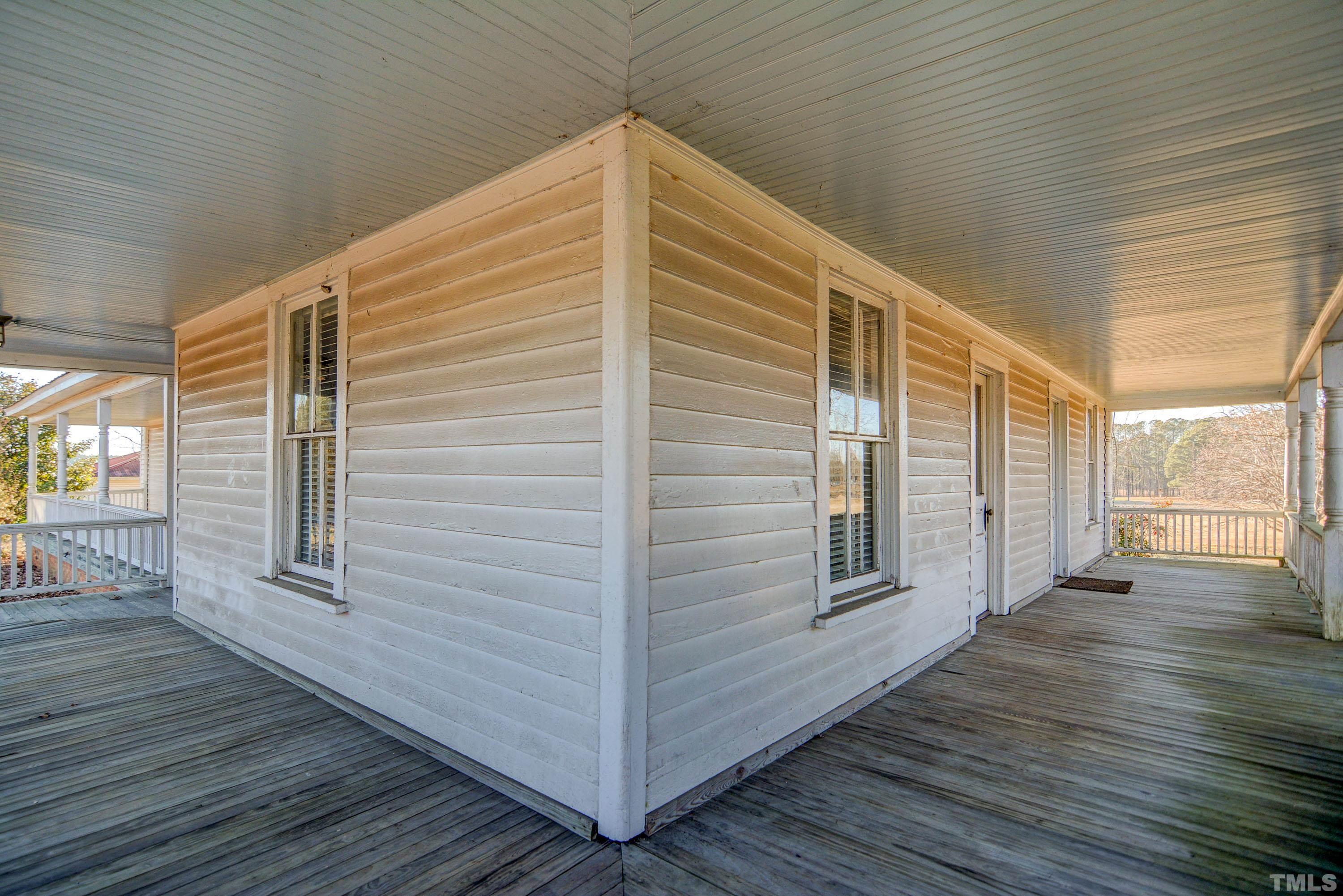 4740 Auburn Knightdale Road Raleigh, NC 27610 - Photo 13 of 23 a view of front door and wooden floor