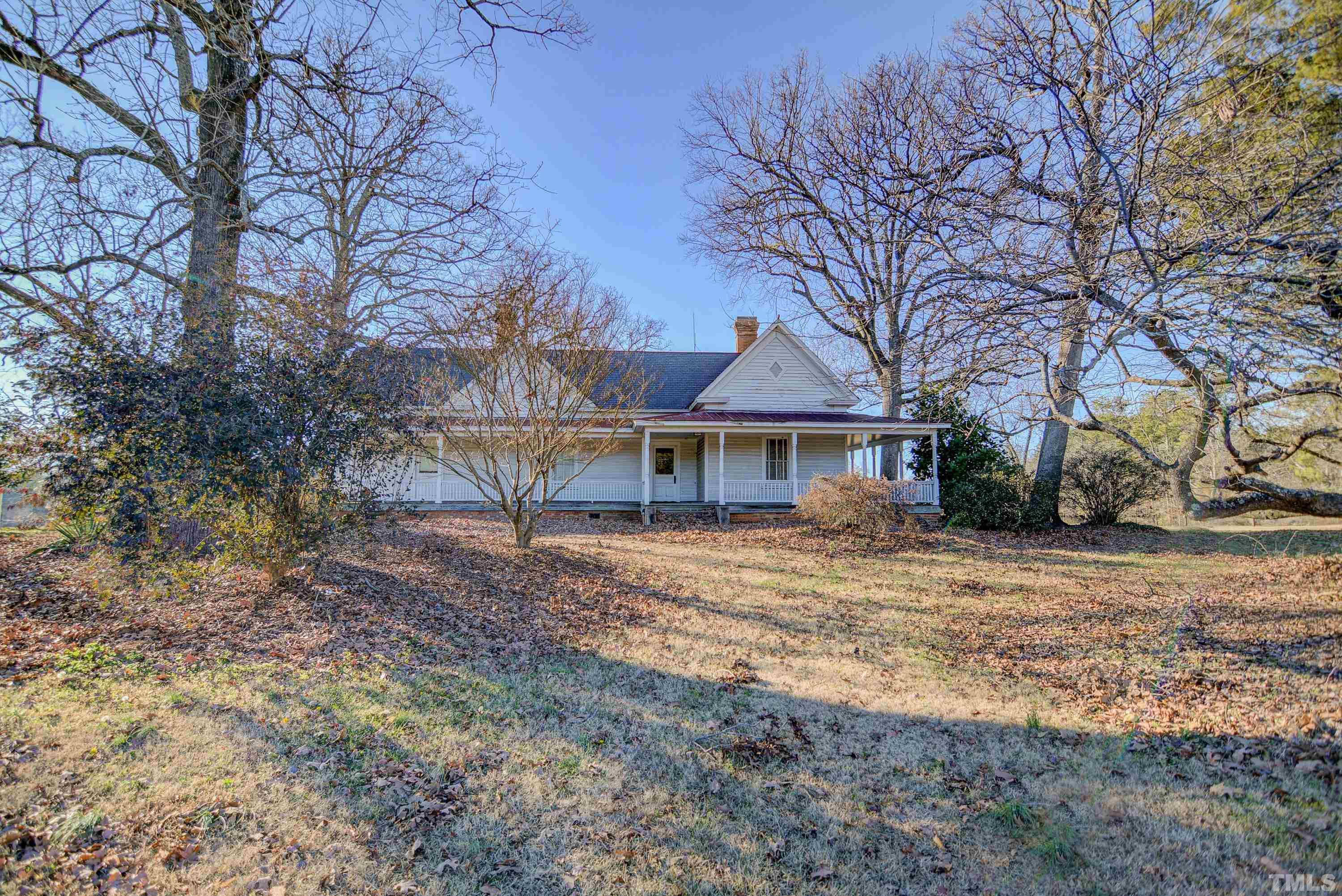 4740 Auburn Knightdale Road Raleigh, NC 27610 - Photo 2 of 23 a front view of a house with a yard