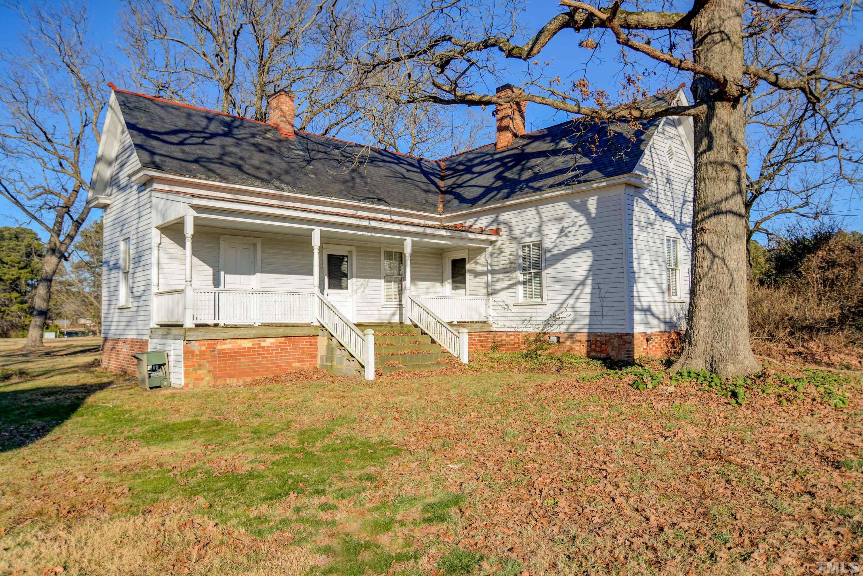 4740 Auburn Knightdale Road Raleigh, NC 27610 - Photo 6 of 23 a view of a backyard with a patio