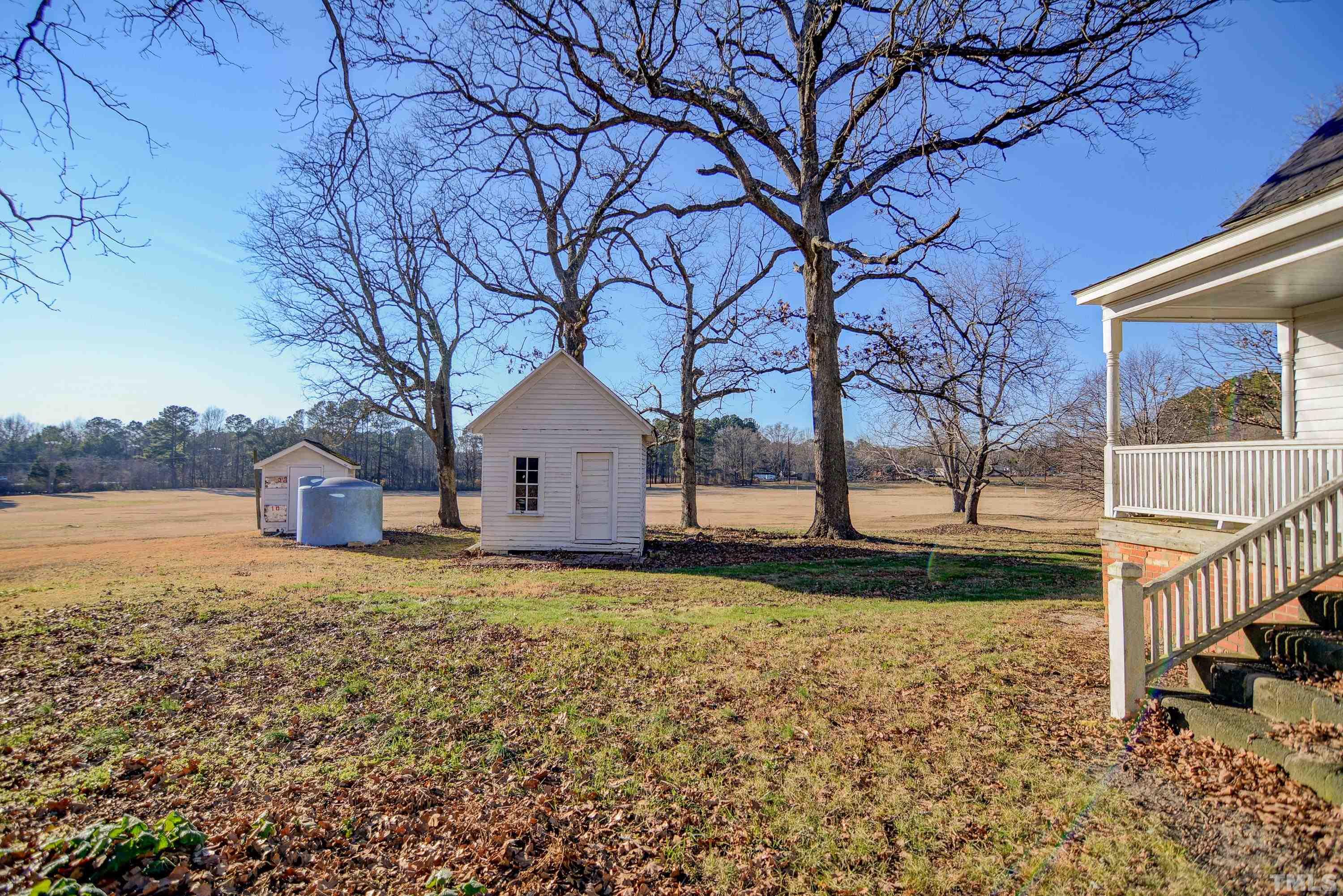 4740 Auburn Knightdale Road Raleigh, NC 27610 - Photo 7 of 23 a house view with backyard space