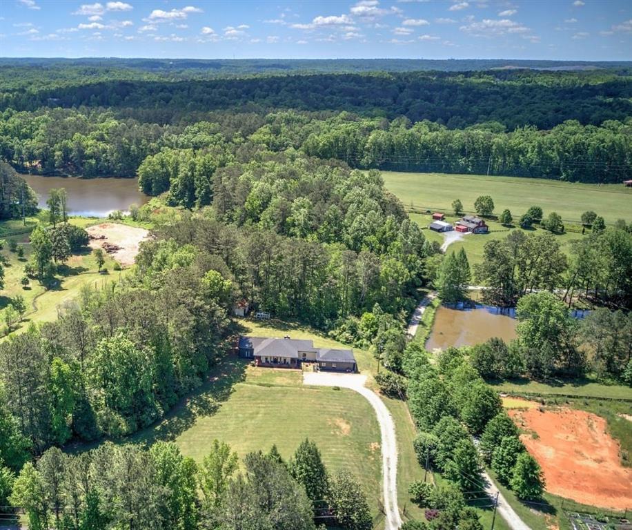 a view of a lake with a yard