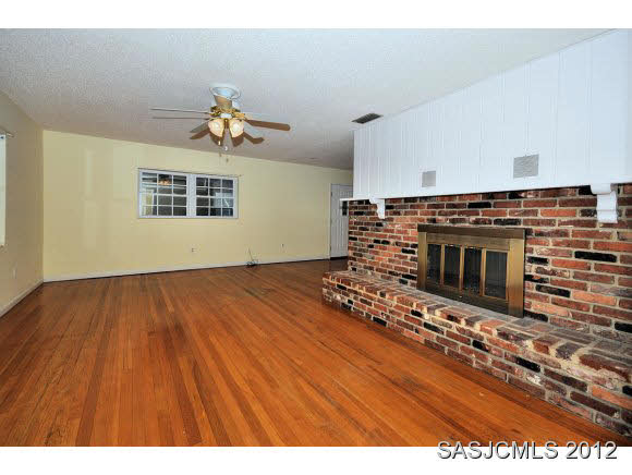 526 Jasmine Road St. Augustine, FL 32086 - Photo 3 of 18 a view of a livingroom with wooden floor