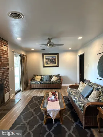 a living room with furniture and a table