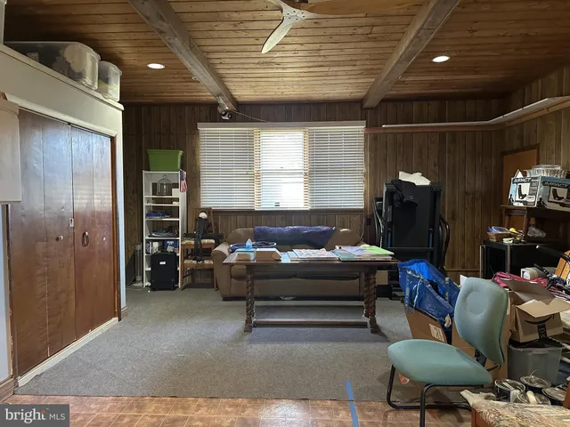 a room with lots of appliances and furniture