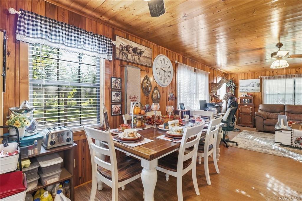8110 Southwest 88th Lane Trenton, FL 32693 - Photo 12 of 29 a view of a dining room with furniture window and outside view