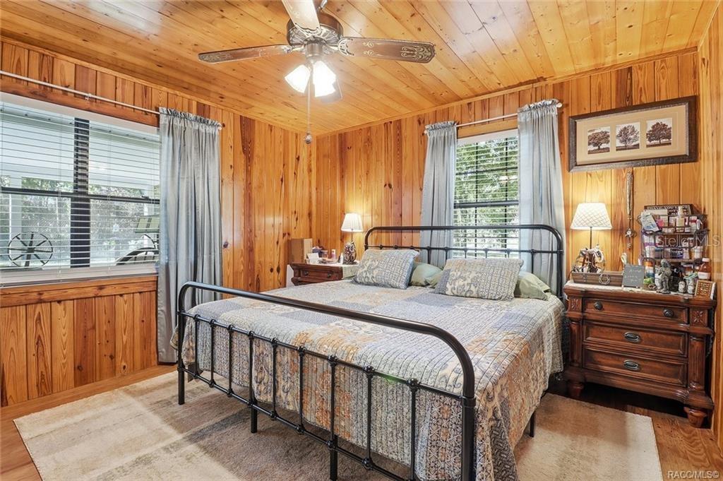 8110 Southwest 88th Lane Trenton, FL 32693 - Photo 19 of 29 a bedroom with a bed and a window