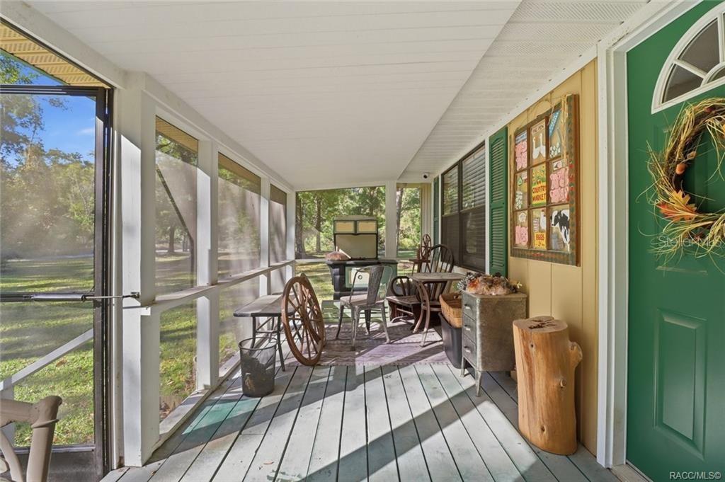 8110 Southwest 88th Lane Trenton, FL 32693 - Photo 5 of 29 a view of a dining room with furniture window and outside view