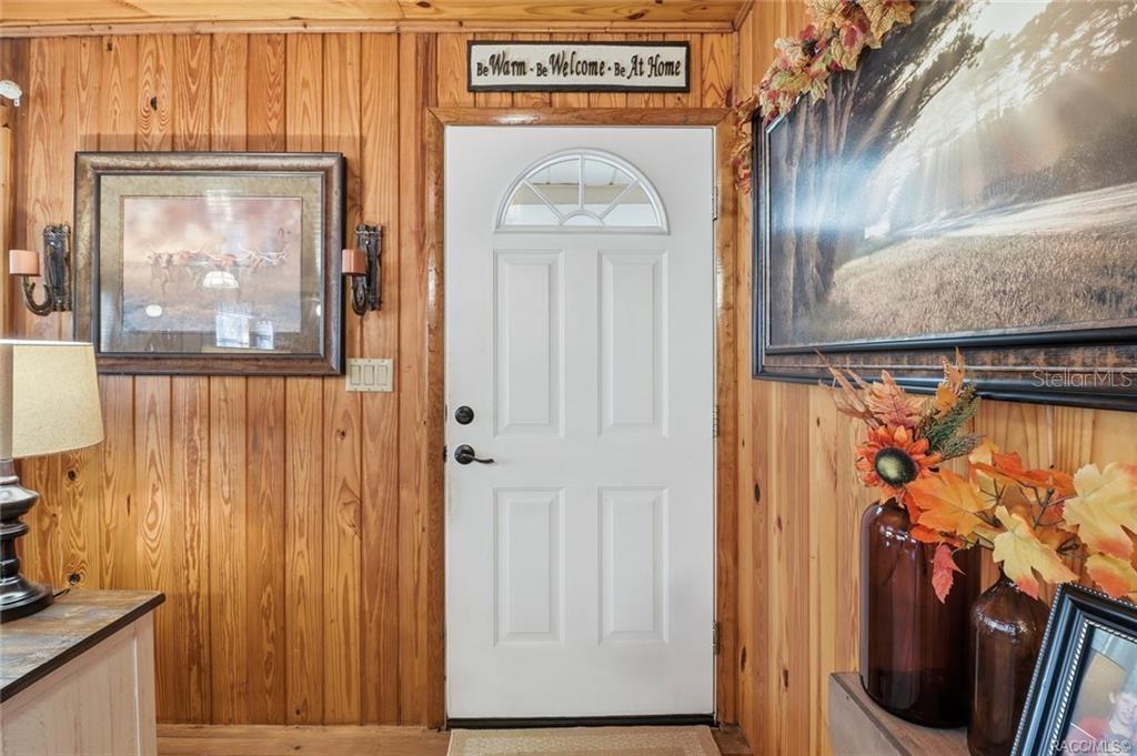 8110 Southwest 88th Lane Trenton, FL 32693 - Photo 6 of 29 a view of a door with wooden door