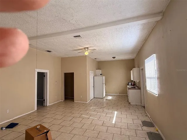 a view of a livingroom with a staircase