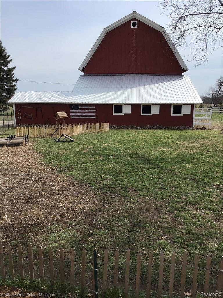 6711 Sharpe Road Fowlerville, MI 48836 - Photo 9 of 47 Horse barn view from the house
