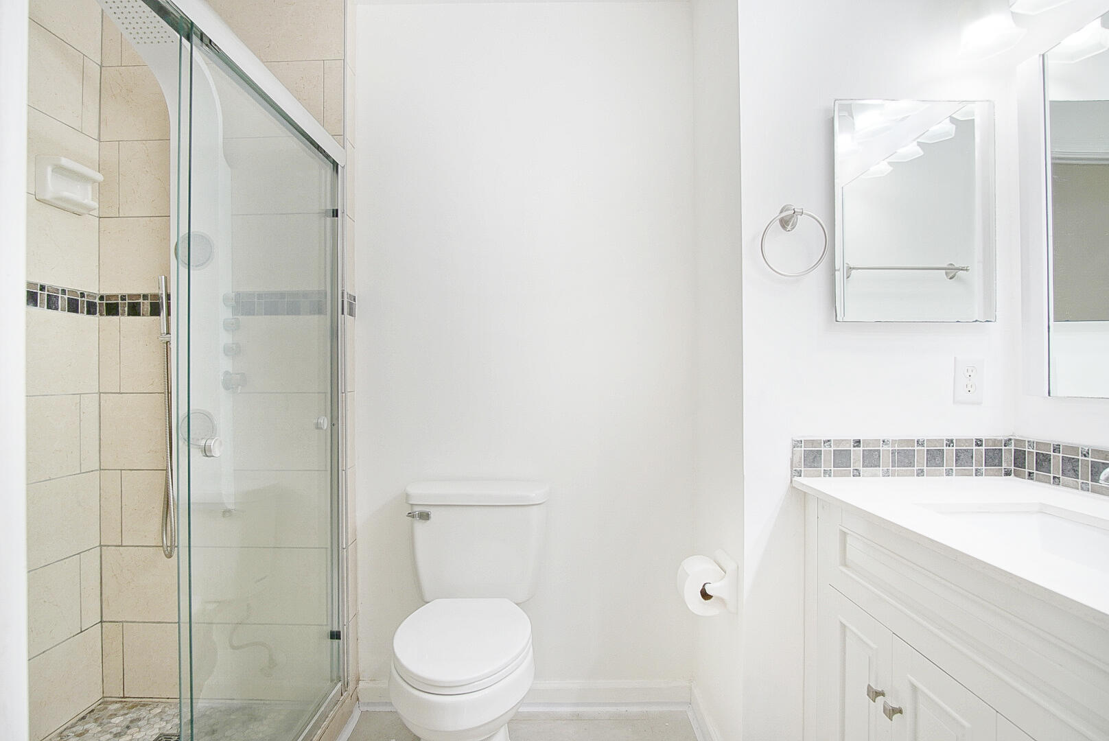 4483 Southeast Murray Cove Circle Stuart, FL 34997 - Photo 21 of 21 a bathroom with a sink a toilet and shower