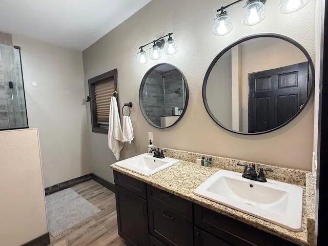 a bathroom with a sink and a mirror