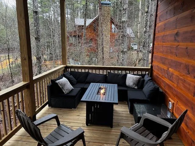 a view of balcony with wooden floor