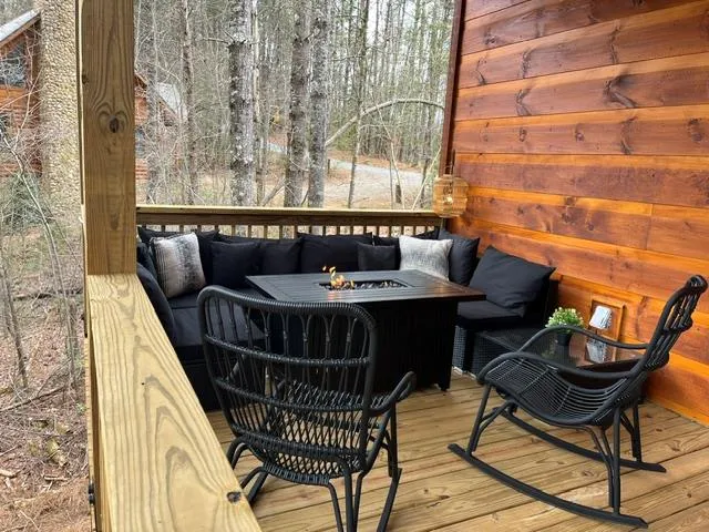 a view of a balcony with furniture