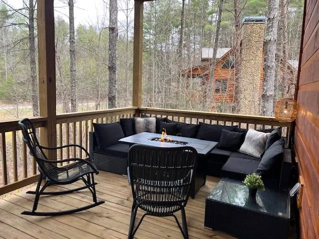a view of balcony with furniture and outdoor seating
