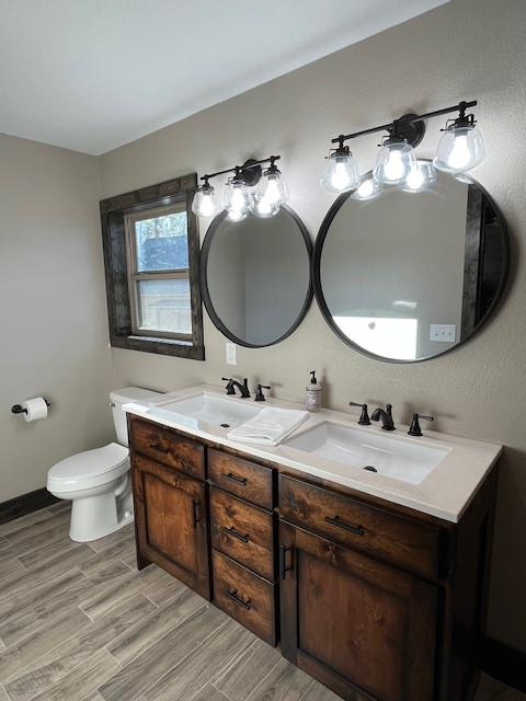 331 Vineyard Creek Way Murphy, NC 28906 - Photo 24 of 43 a bathroom with a toilet sink and mirror