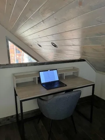 a room with table and chairs