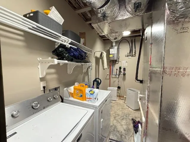a bathroom with a sink mirror and vanity