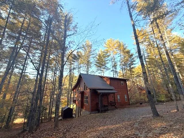 a view of a pathway with a yard