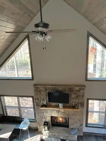 a living room with furniture a window and appliances