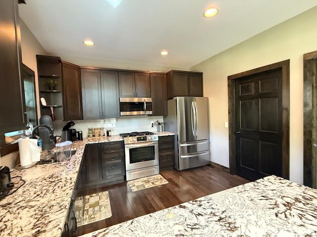 331 Vineyard Creek Way Murphy, NC 28906 - Photo 8 of 43 a kitchen with stainless steel appliances kitchen island granite countertop a refrigerator stove and sink