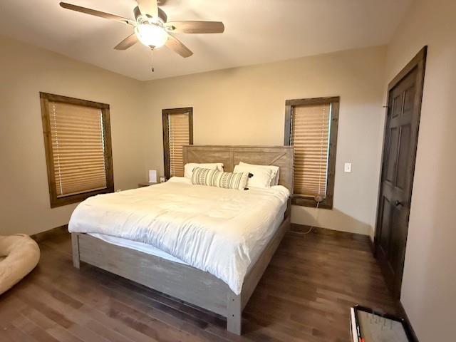 331 Vineyard Creek Way Murphy, NC 28906 - Photo 10 of 43 a large bed sitting in a bedroom next to a window and a chandelier