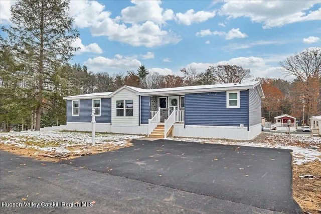 a front view of a house with a space